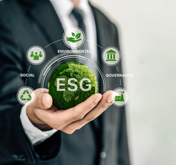 ESG-icon in the hand of a manager.