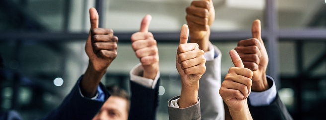 Hands displaying a thumbs-up gesture.